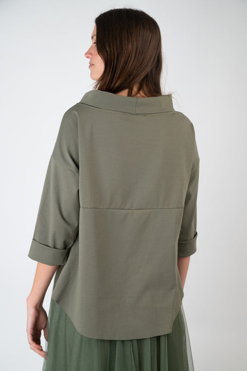 Top elegante con ampio dolcevita Inga